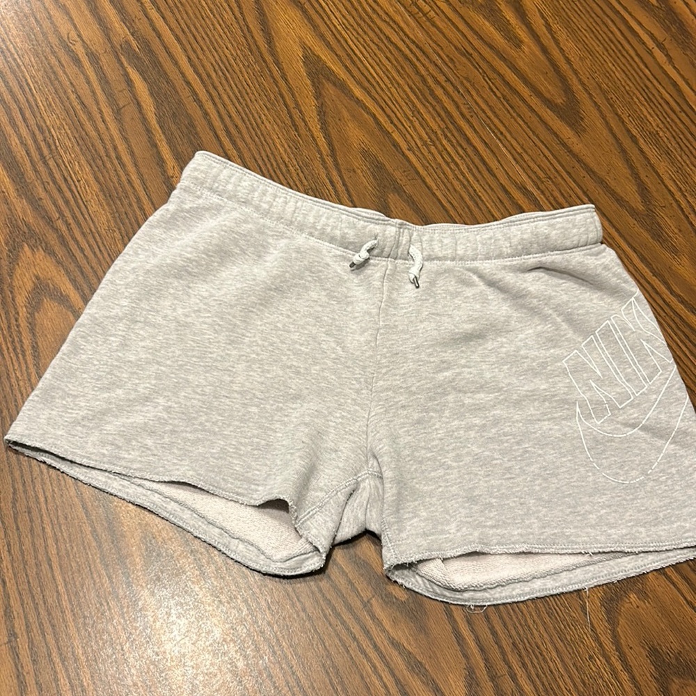 Gray Nike sweat shorts.